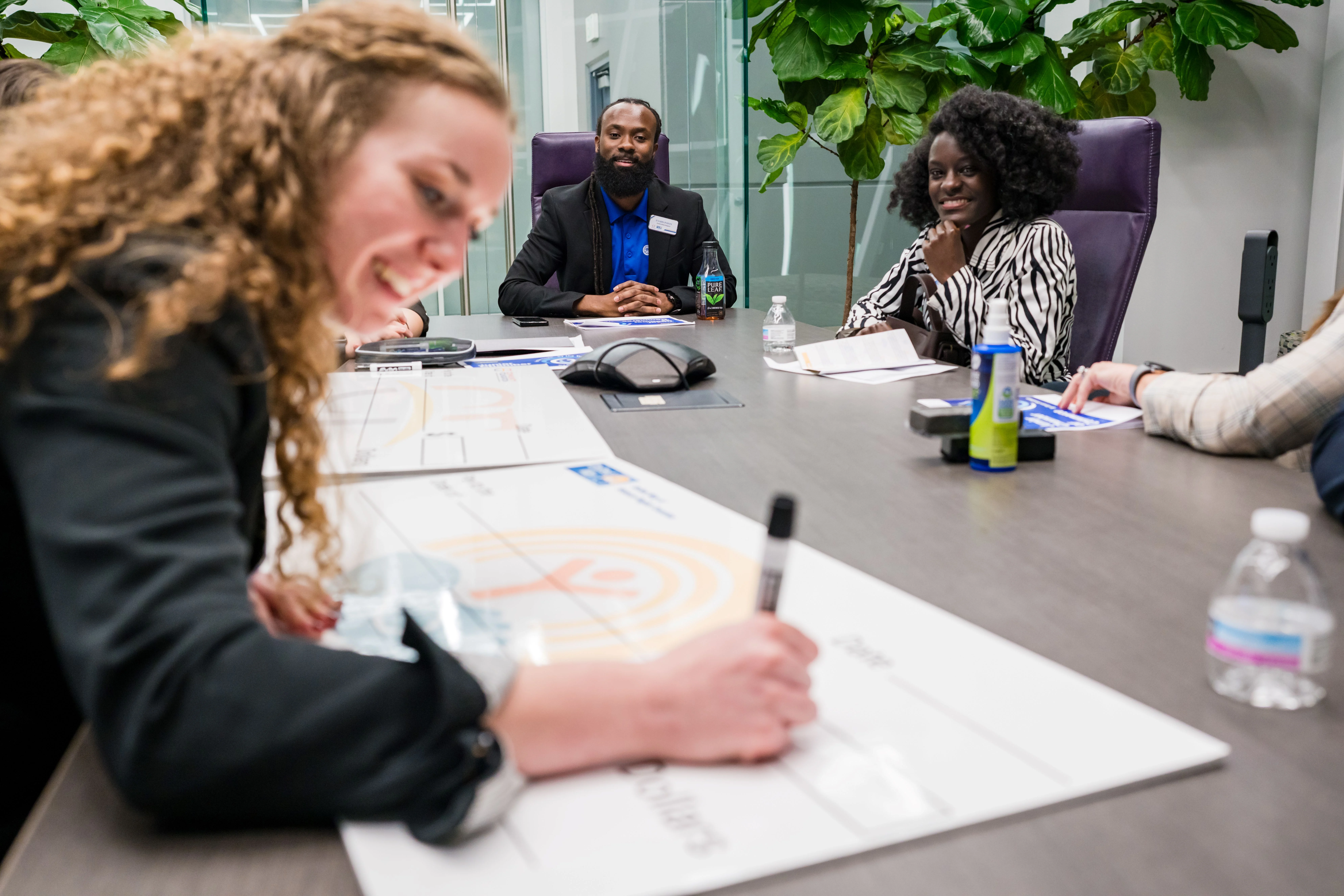 SIF Chairperson writing "big check."