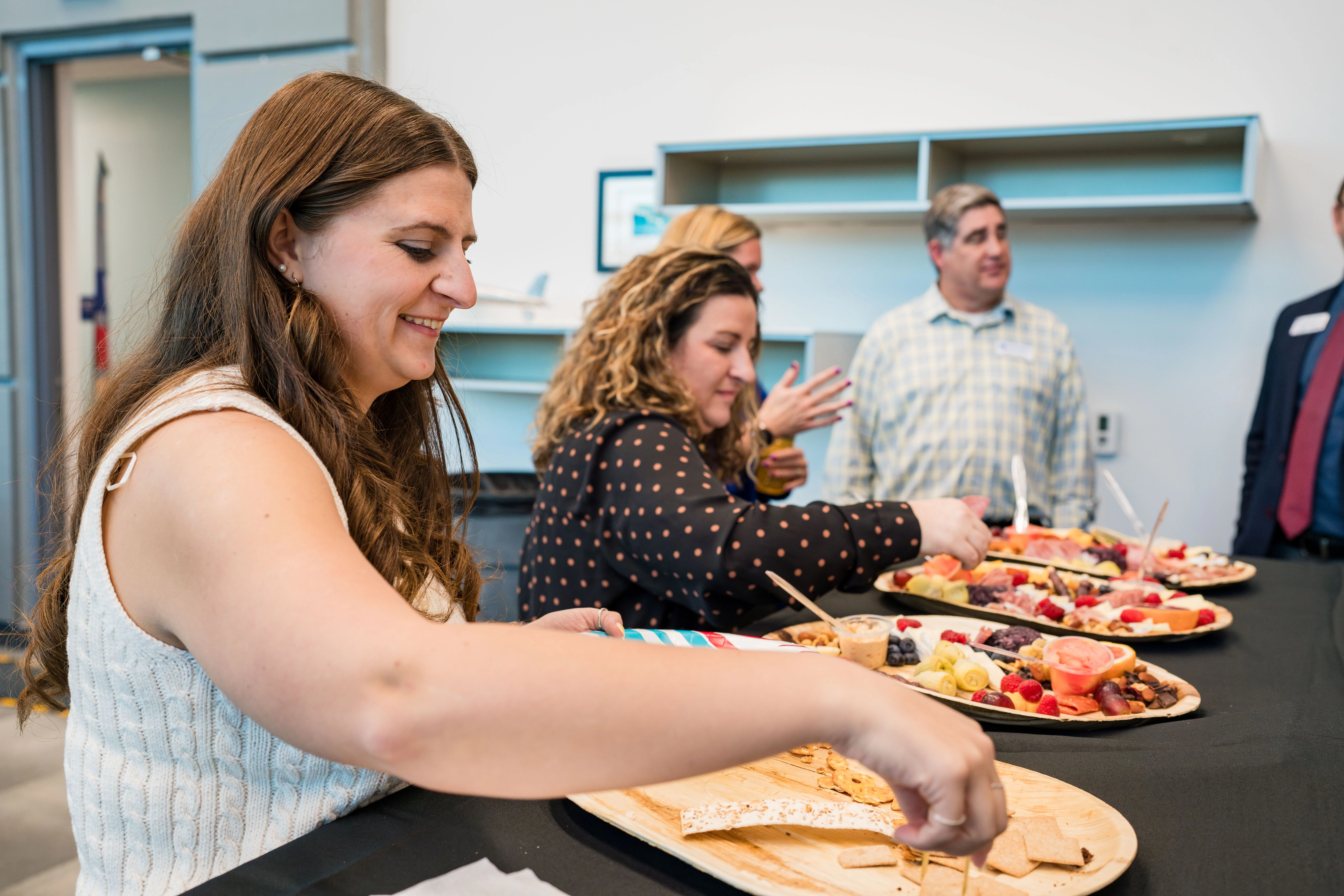 People enjoying the refreshments.